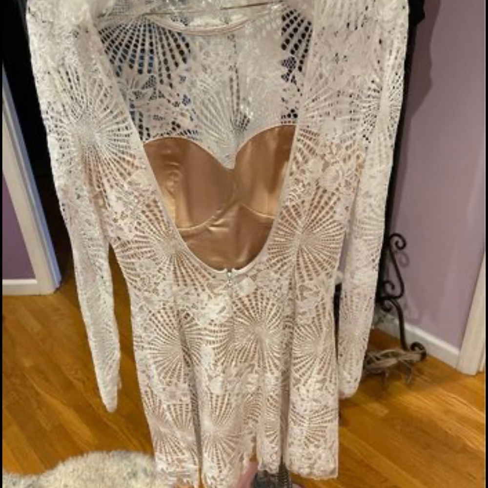 Beautiful crochet white Bebe dress
